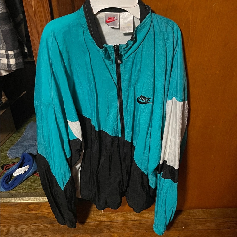 Nike Men’s Teal, White and Black track jacket